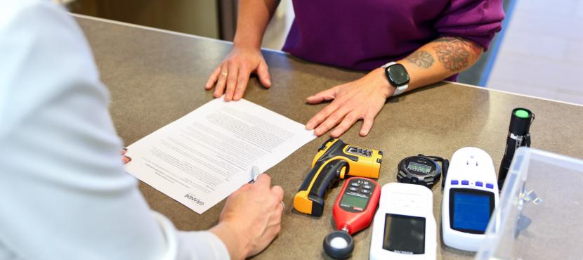 Image of person borrowing a home energy check kit