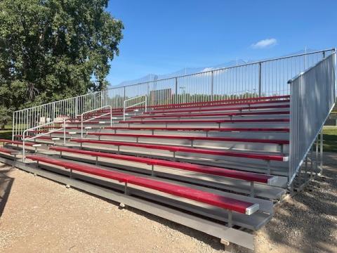 Bleacher advertising at Fossil Energy Ball Park